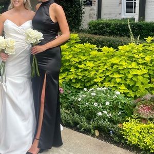 Hi! I am selling this size 0 black bridesmaid dress. Worn once. Like new!